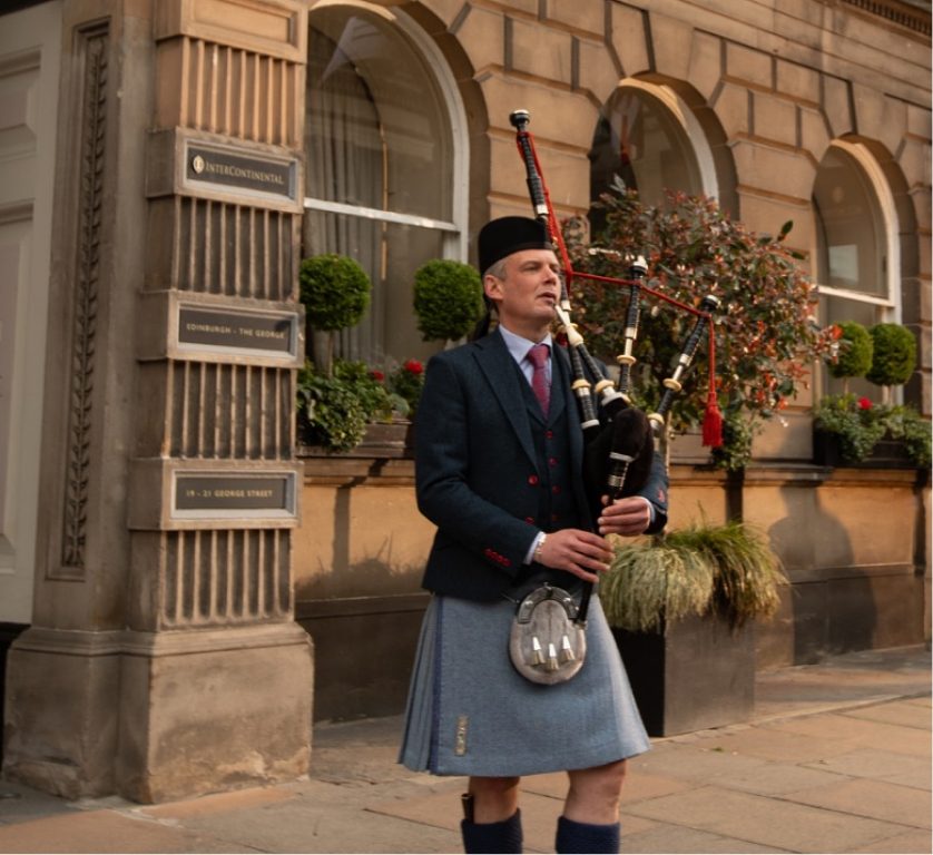 Piper outside InterContinental Edinburgh The George