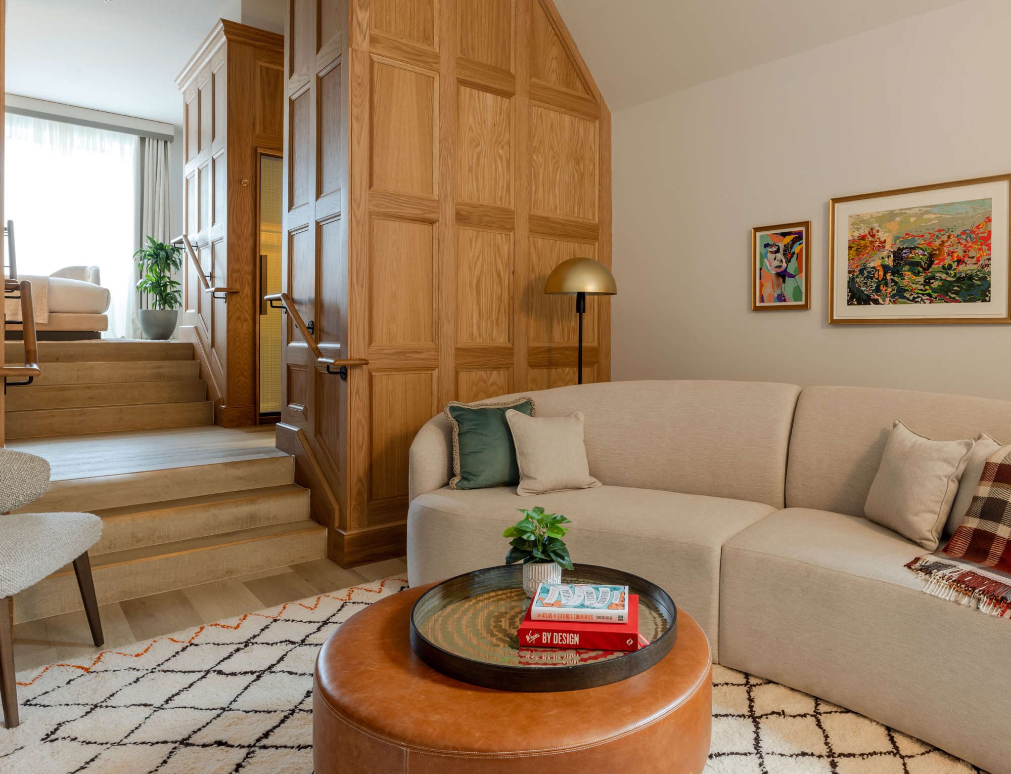 Lounge at Virgin Hotels Edinburgh with a curved sofa